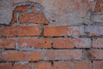 A dirty brick wall.