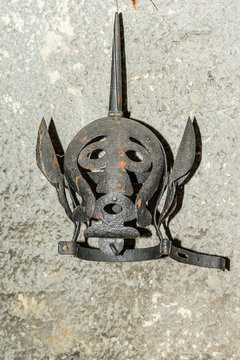 Belgrade, Serbia September 23, 2015: Medieval devices to torture people. Mask of executioner