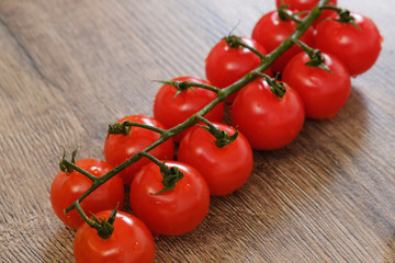 Cherry tomatoes on the wooden table