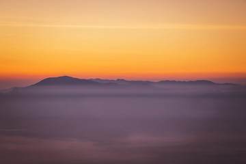 sunrise with fog on the Mountain in the morning