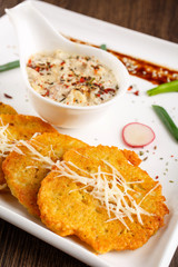 Potato pancake with sauce