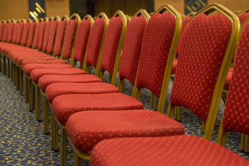 Obraz premium red chairs in the conference room