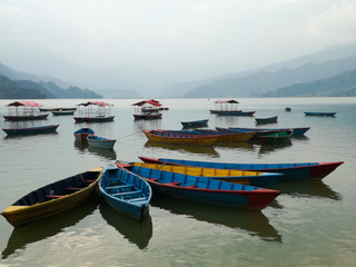 boats on pokhara lake