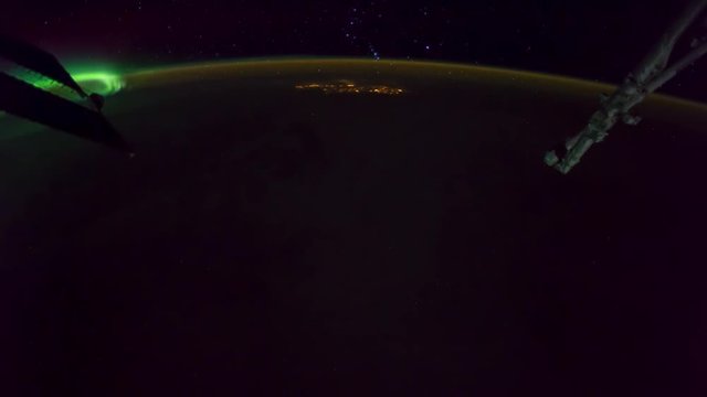 ISS view of rotating planet earth with aurora and star galaxy. Created from Public Domain images, courtesy of NASA JSC : http://eol.jsc.nasa.gov.