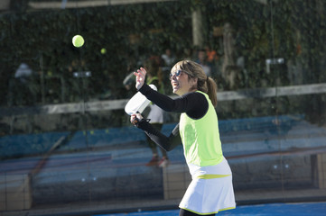 One women 47 years old playing Paddle tennis