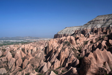 Unique geological formations in Red valley, Cappadocia, Turkey