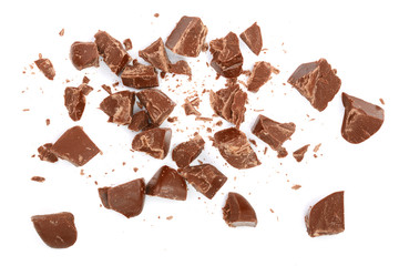 Chocolate pieces isolated on white. Top view. Flat lay