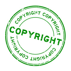 Grunge green copyright round rubber seal stamp on white background