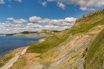 Fototapeta na wymiar South West Coast Path with a view over the Jurassic Coast and Emmett's Hill, near Worth Matravers, Jurassic Coast, Dorset, UK