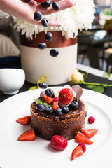 professional decoration confectionery dessert concept. working process. delicious chocolate cake.