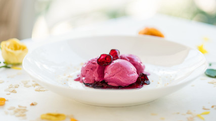 delicious refreshing pink ice cream balls concept. cold restaurant dessert. sweets for children
