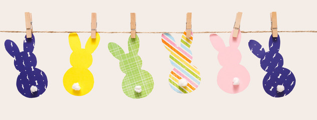 Garland with easter bunnies isolated on white background, copy space