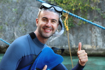 Diver giving a thumbs up after an immersion