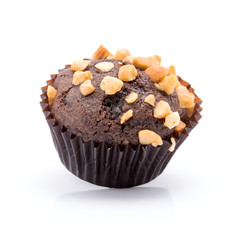 One chocolate muffins with nuts crumbs isolated on white background
