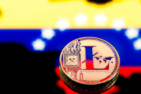 coins litecoin, amid Colombia flag, concept of virtual money, close-up. Conceptual image.
