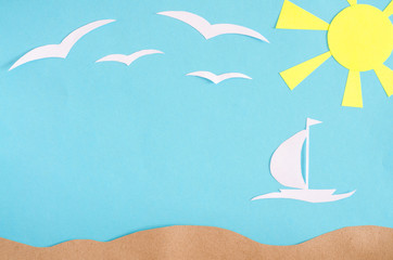 Summer background with sailboat sailing in the sea. Paper cut.