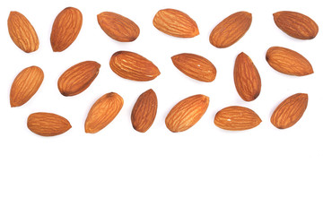 almonds isolated on white background with copy space for your text. Top view. Flat lay pattern