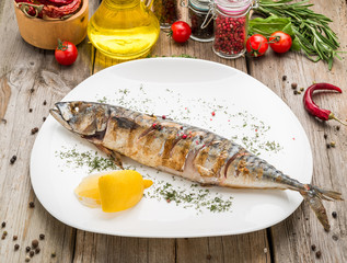 Oktoberfest menu. Grilled mackerel fish with beer and pretzel served