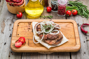 Grilled steaks on wood, beef steak