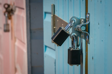 A locked beach hut in Budleigh Salterton, Jurassic Coast, Devon, UK