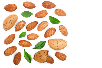 almonds with leaves isolated on white background with copy space for your text. Top view. Flat lay pattern