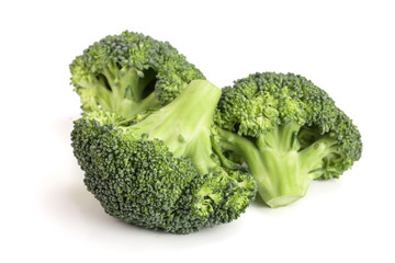 fresh broccoli isolated on white background close-up. Top view