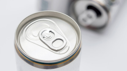Close up of aluminum cans on a top view.