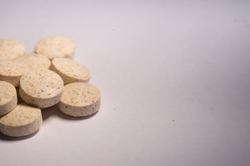 Vitamins on white background