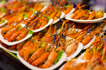Cooked Shrimp In Plates At Thai Street Market