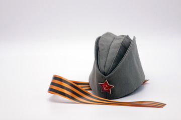Military cap with Communist decoration, the Red star with hammer and sickle.St.