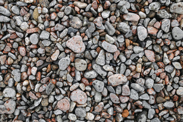 Dry colored sea stones background