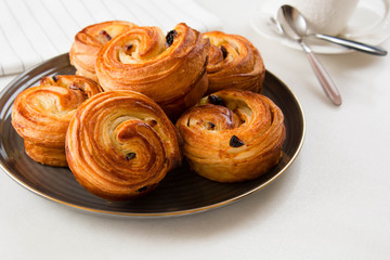 French traditional pastries. Croissant. Pains aux raisins.