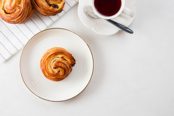 French traditional pastries. Croissant. Pains aux raisins.