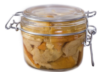 pickled marinated porcini mushrooms in glass jar 