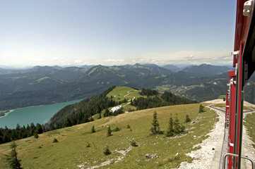 Old steam locomotive is climbing up the schafbergbahn in Austria