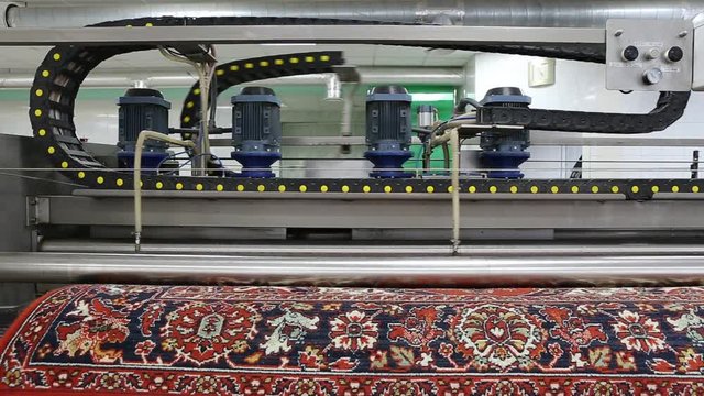Automatic washing and cleaning of carpets. Industrial line for washing carpets