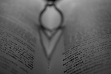 Love, a stunning diamond engagement ring creates a heart in the dictionary.
