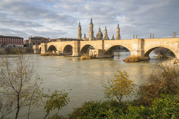 Fototapeta premium Panoramic view of the Zaragoza. Cathedral-Basilica of Our Lady of the Pillar and the Ebro River. Spain.