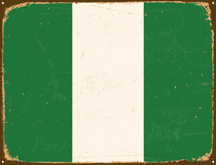 Vintage Metal Sign - Nigeria Flag - Vector EPS10. Grunge scratches and stain effects can be easily removed for a cleaner look.