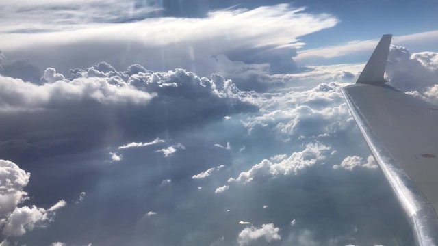 clouds through aeroplane window