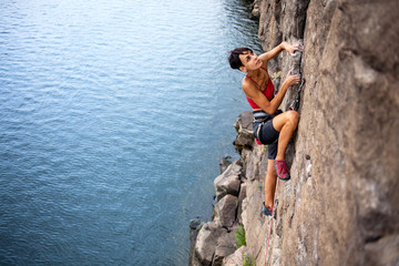 Climber over the water