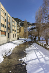 Winter pyrenes landscape near Village of Canillo, trekking and cycling trail. Andorra.