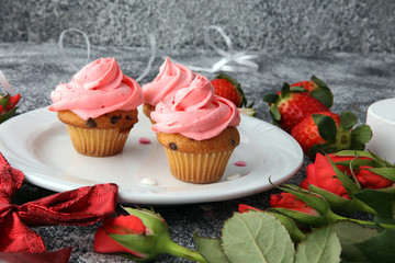 Delicious cupcake for Valentine Day. cake for Valentines day with chocolate and strawberries. Traditional homemade with red roses