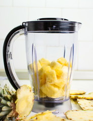 Pineapple in a blender for a smoothie