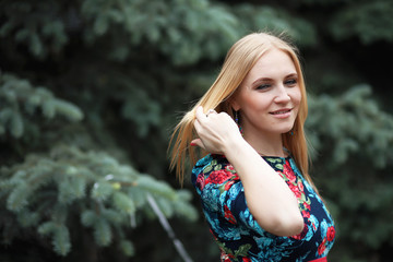 Naklejka premium Girl in the street with an umbrella