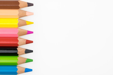 A row of colored pencils