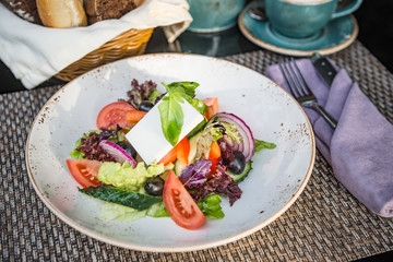Greek Salad in Plate in Sunrays