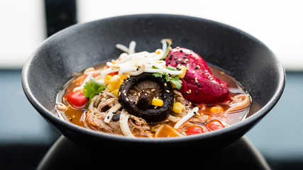 Bowl of ramen. Traditional fast food meal of Japanese Chinese and Korean cuisine. Tasty noodle soup