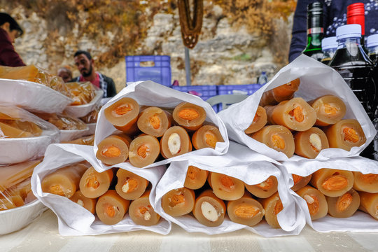 Soushoukos, a sweet with nuts in the centre, made with grape juice.