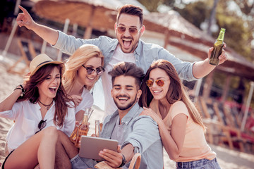 Happy friends having fun,taking a picture together.